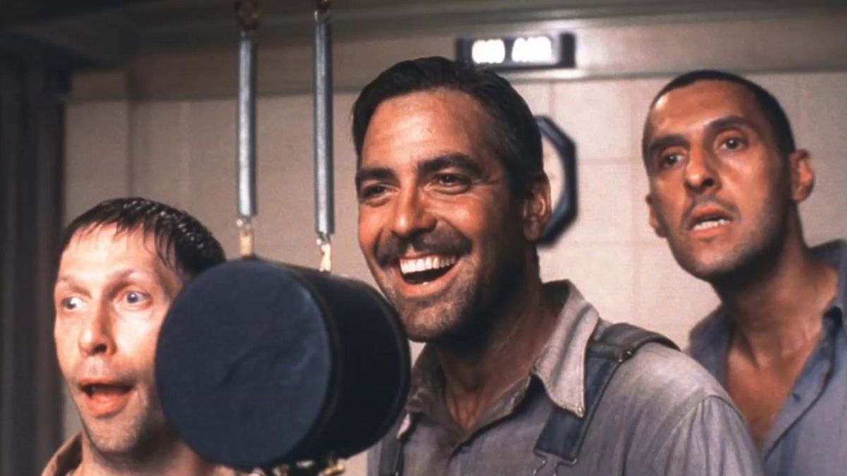 Delmar, Everett and Pete singing together at a recording microphone